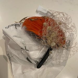 Custom handmade feather fascinator on headband